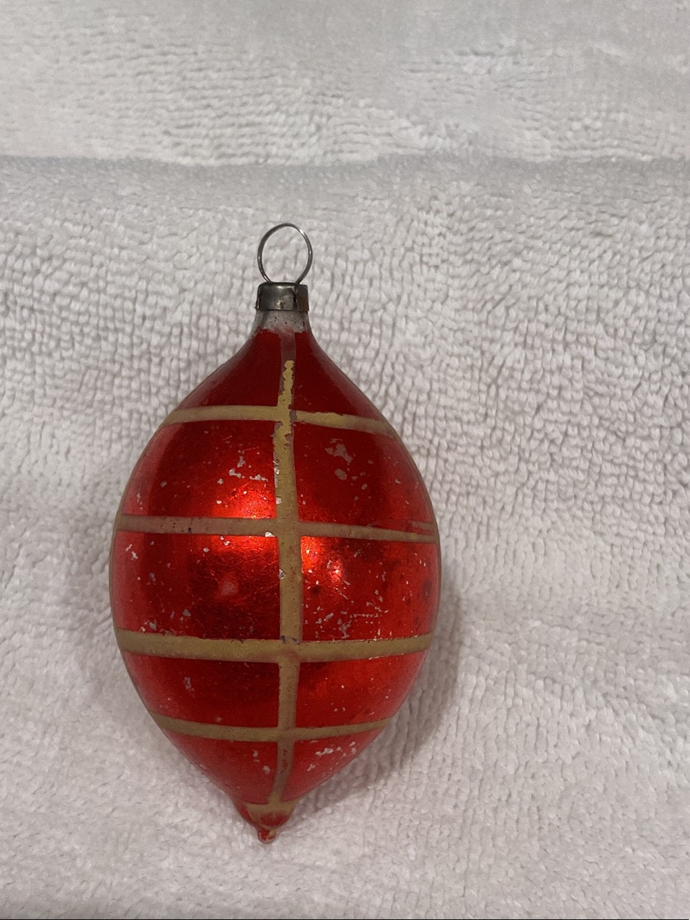 Shiny Red Glass Holiday Ornament with Gold Grid Accent